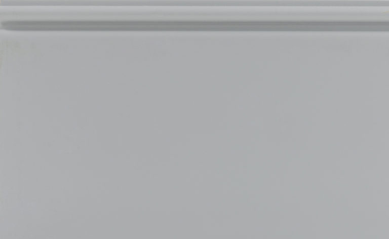Close-up of a gray panel with a label.