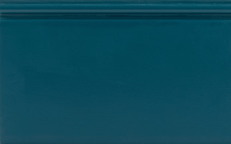 Dark blue surface with white label