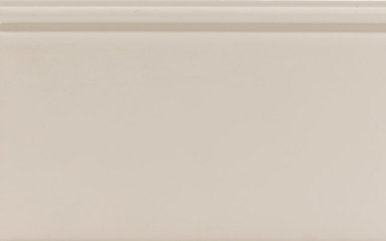 Beige ceramic tile with reference code label.