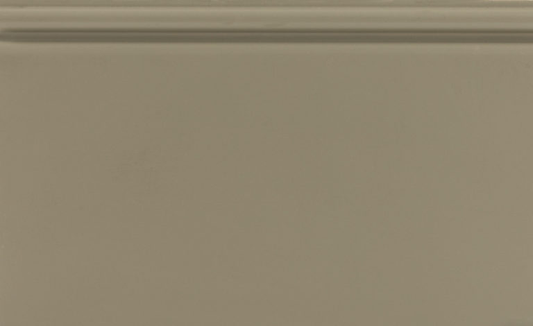 Beige surface with label displaying code.