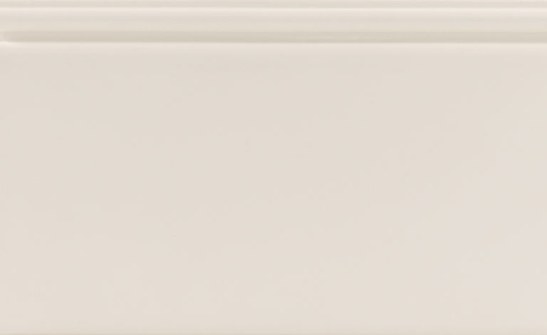 Plain beige surface with coded label.