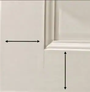 Cabinet door corner with measurement arrows