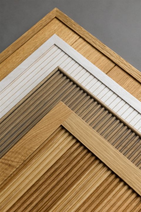 Assorted wooden panel textures stacked diagonally.