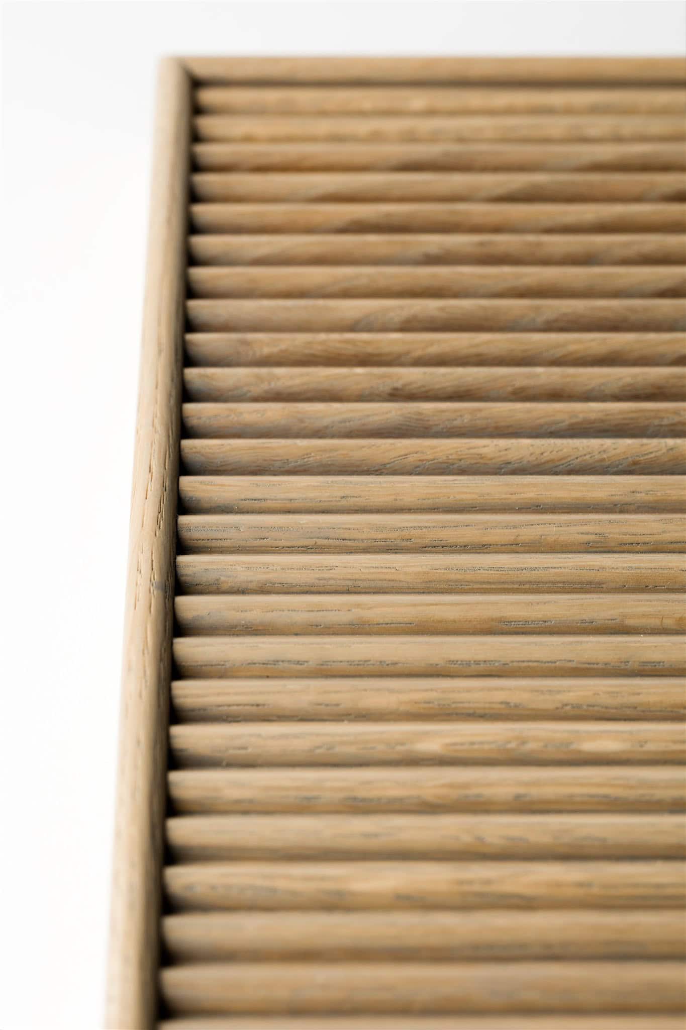 Close-up of wooden slatted surface.